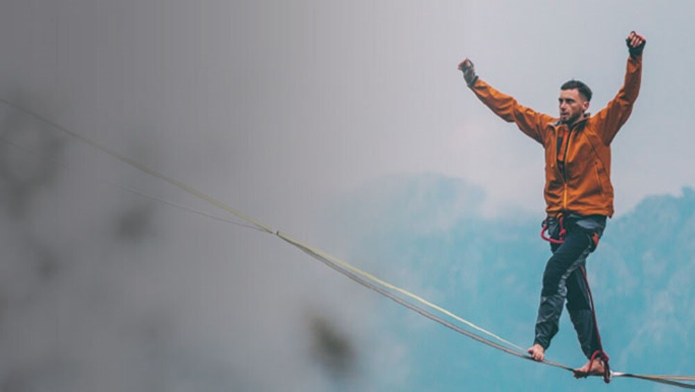 Man walking on a rope
