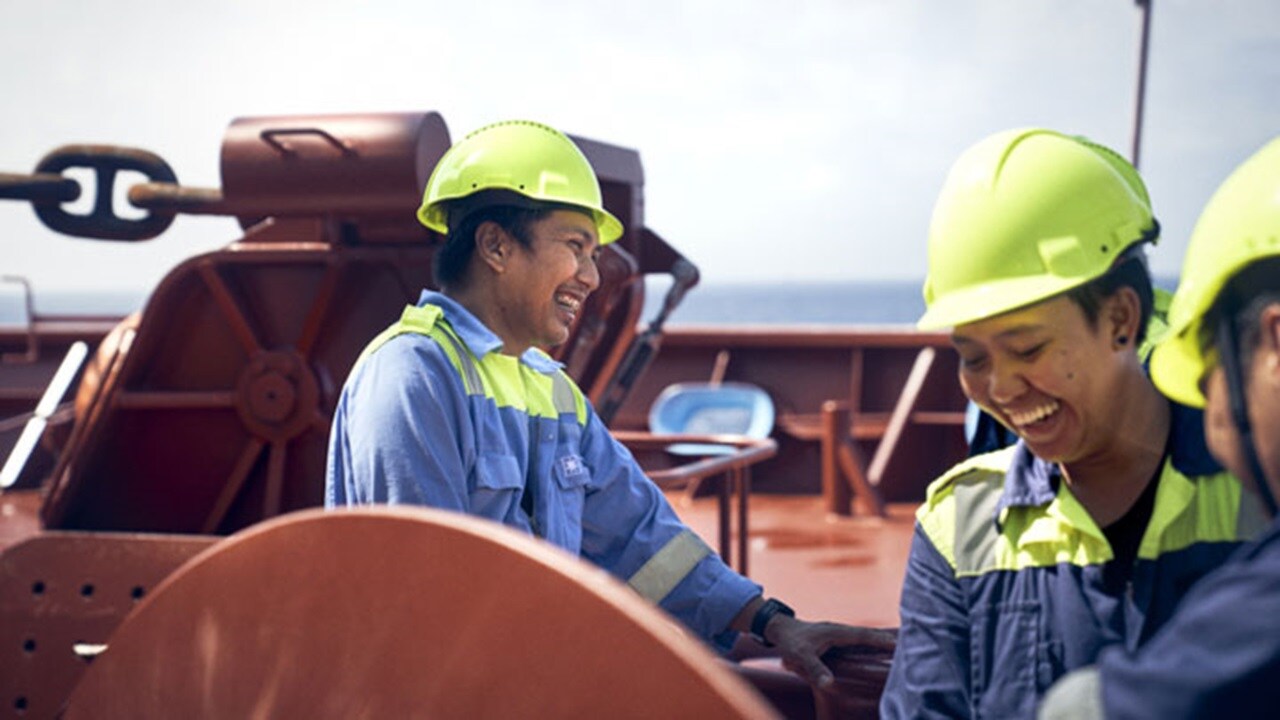 Crew working outdoors during sailing in the South China Sea.