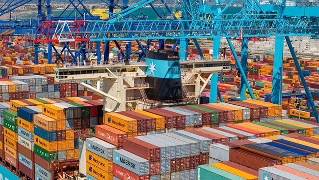 Multiple containers stacked on Evelyn Maersk at Valencia port