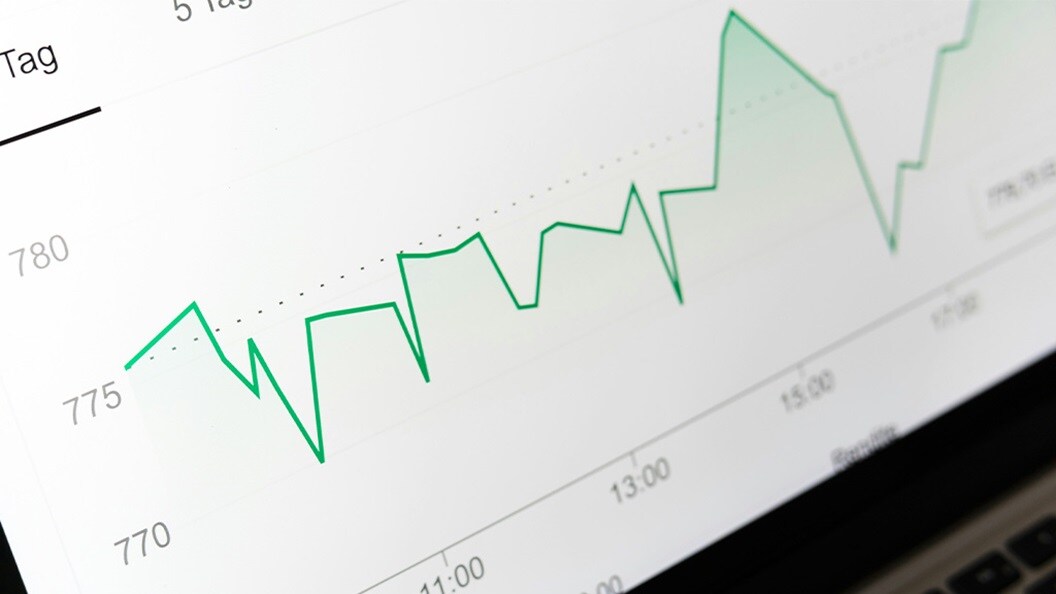 Line graph showing fluctuating data trends over time on a computer screen.