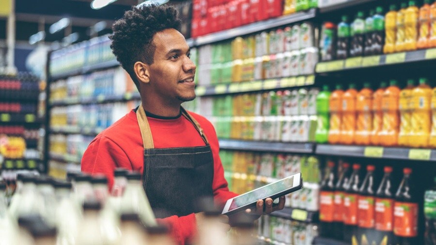 Male browsing the grocery store for products