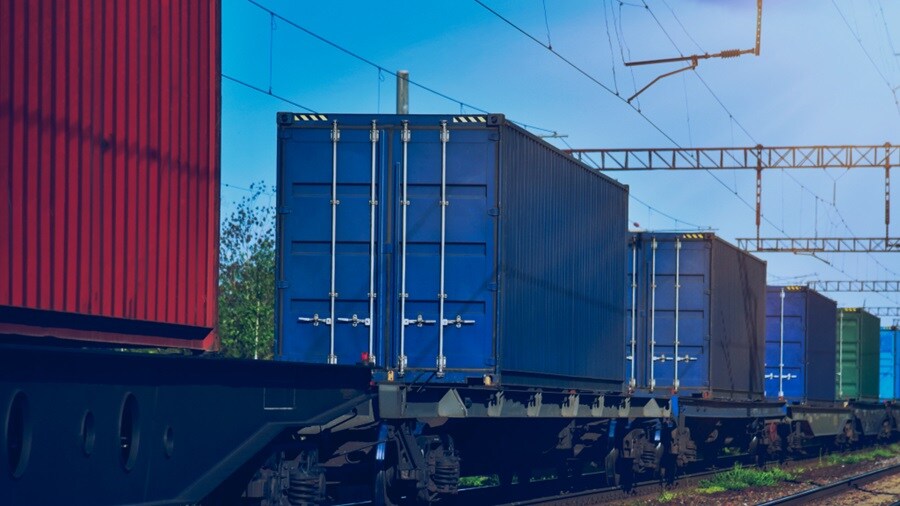 Shot of containers on a rail
