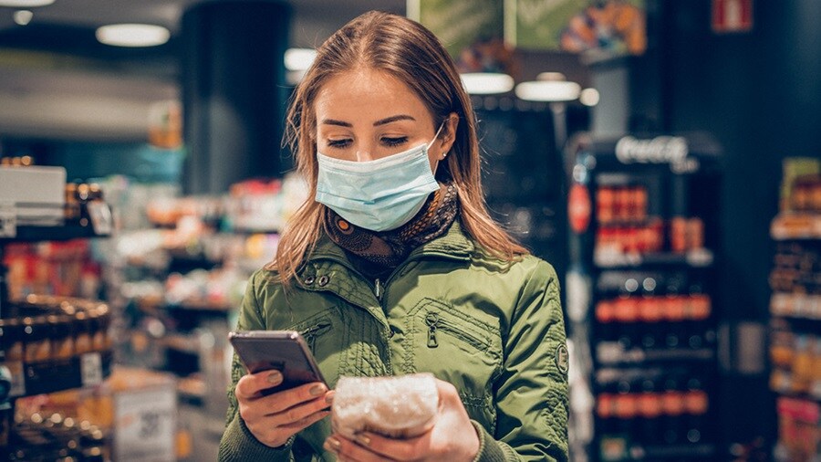 Woman shopping with face mask on