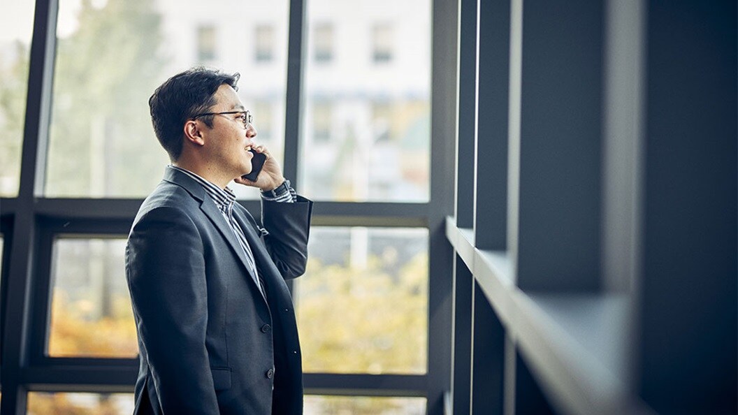 A male talking on the phone