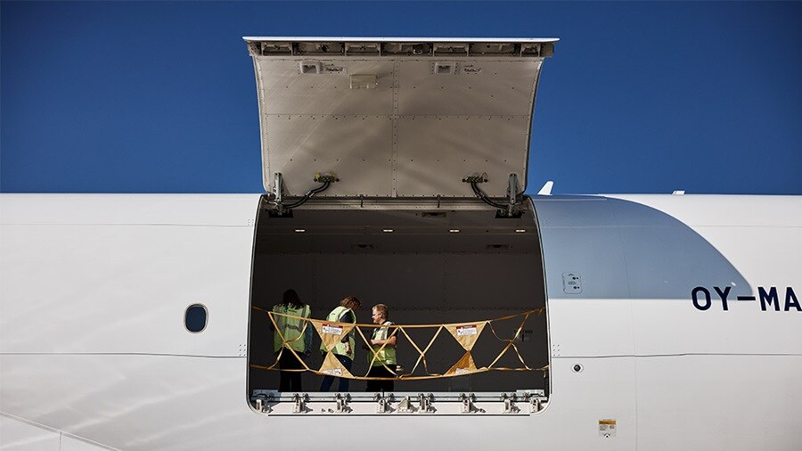 Side view of cargo space on a Maersk Air cargo Boeing 777F.