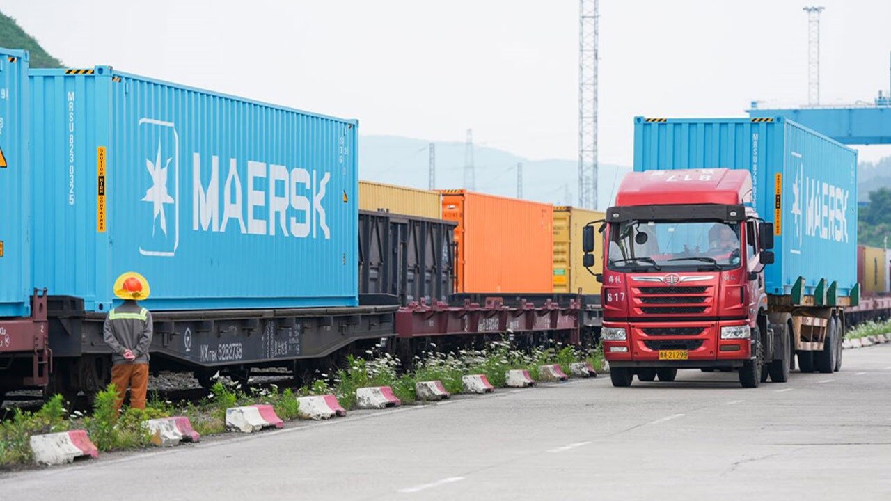 Maersk containers on train and truck