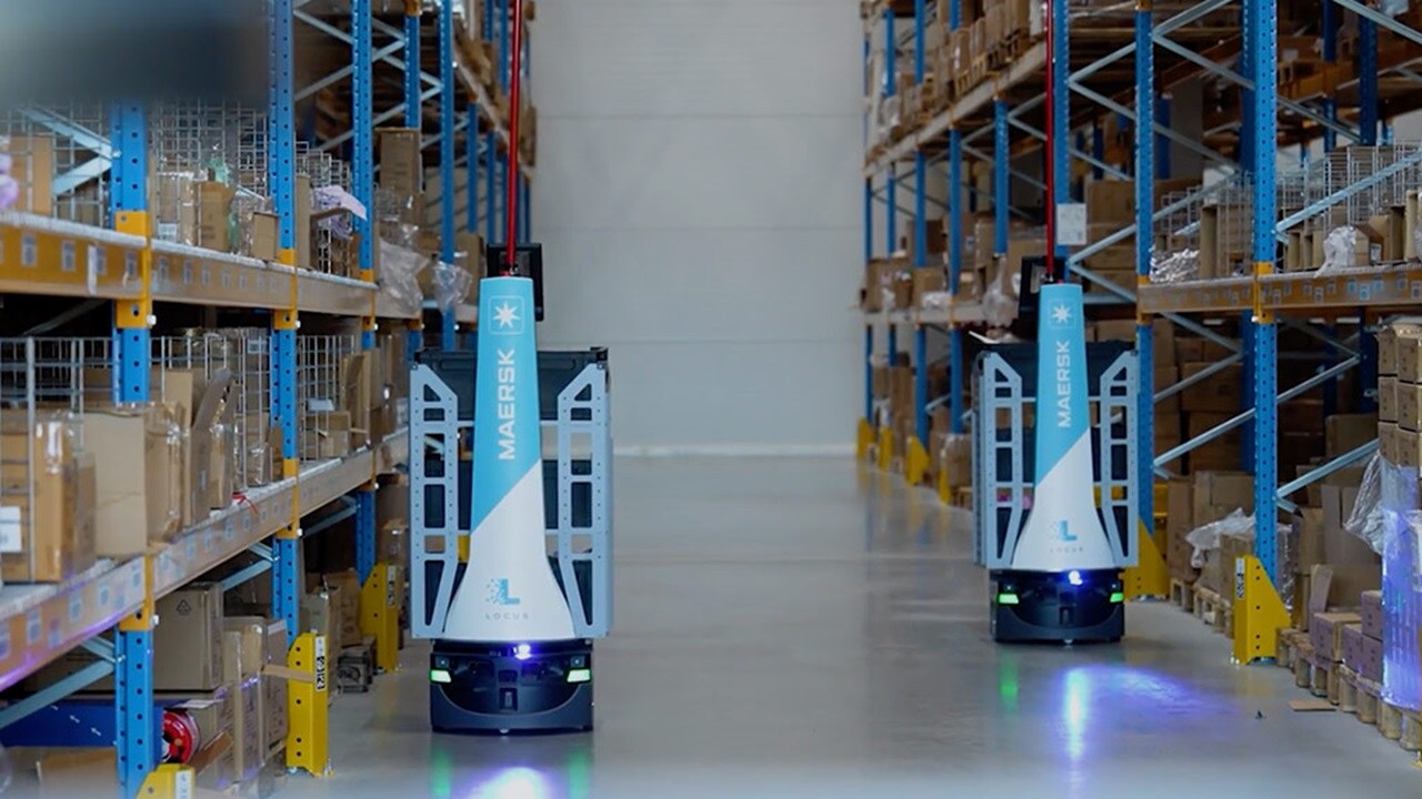 Maersk robots navigating through warehouse aisles