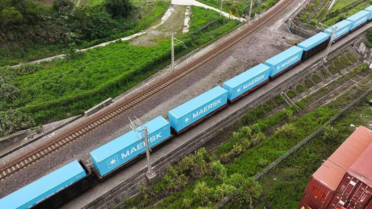 Blue Maersk containers on rail