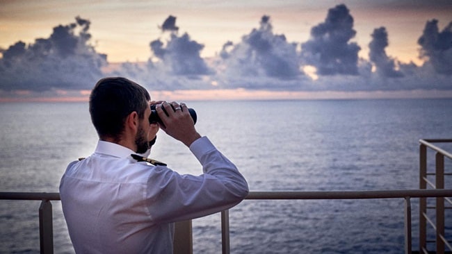 Men with binoculars
