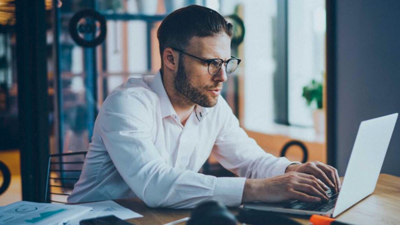 A man working on his laptop