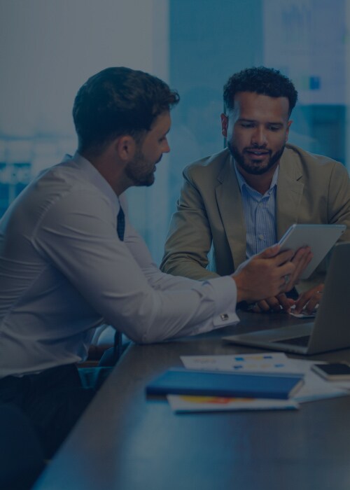 Two business professionals discussing ocean contract 